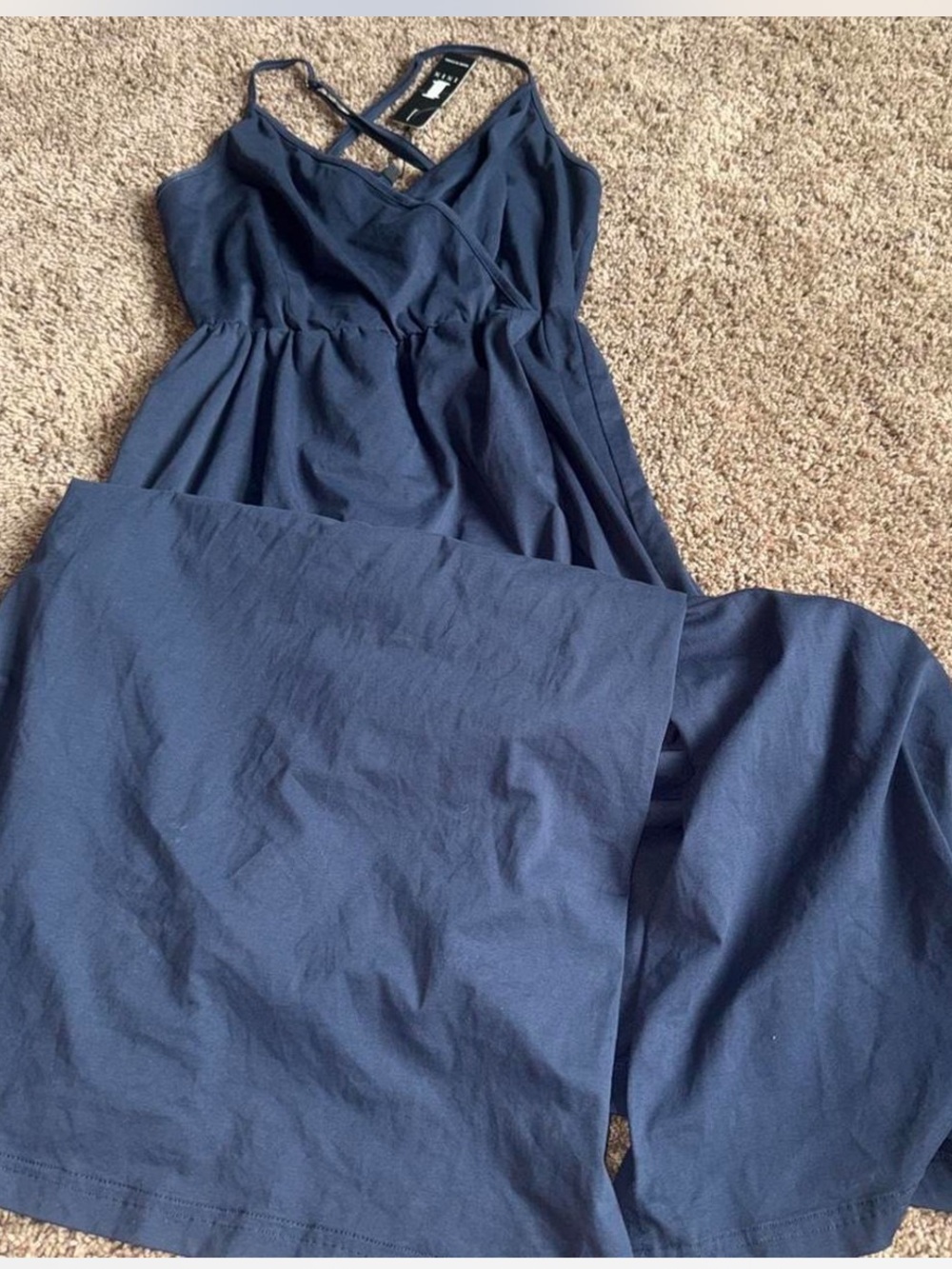 ININ Navy blue maxi dress with a flowy skirt and spaghetti straps with slit